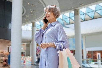 Wealthy senior woman in a shopping mall