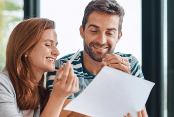 couple looking at paperwork together