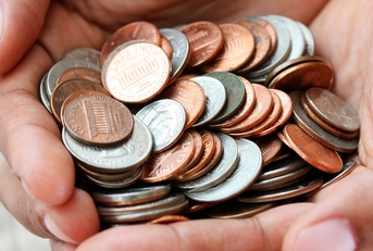 Hand full of coins