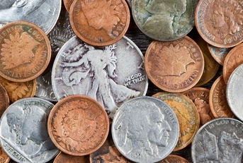 US old coins spread on the table
