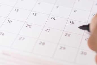 Paper calendar with a focus on the 15th