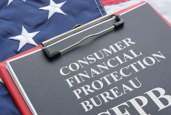 CFPB on paper with American flag
