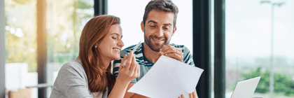 couple looking at paperwork together