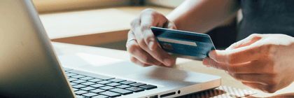 Person looking at their credit card statement online