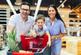 family with child and shopping cart