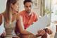 young couple arguing about utility bills
