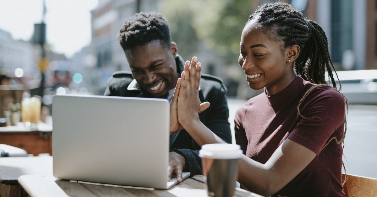 Students giving each other a high five