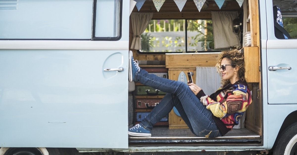 Woman sitting in van