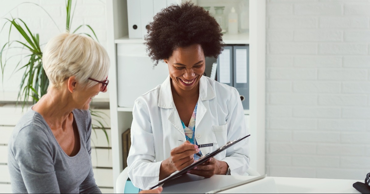 senior woman talking to her doctor