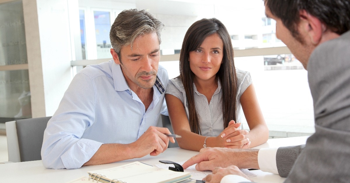 dad and daughter sign loan