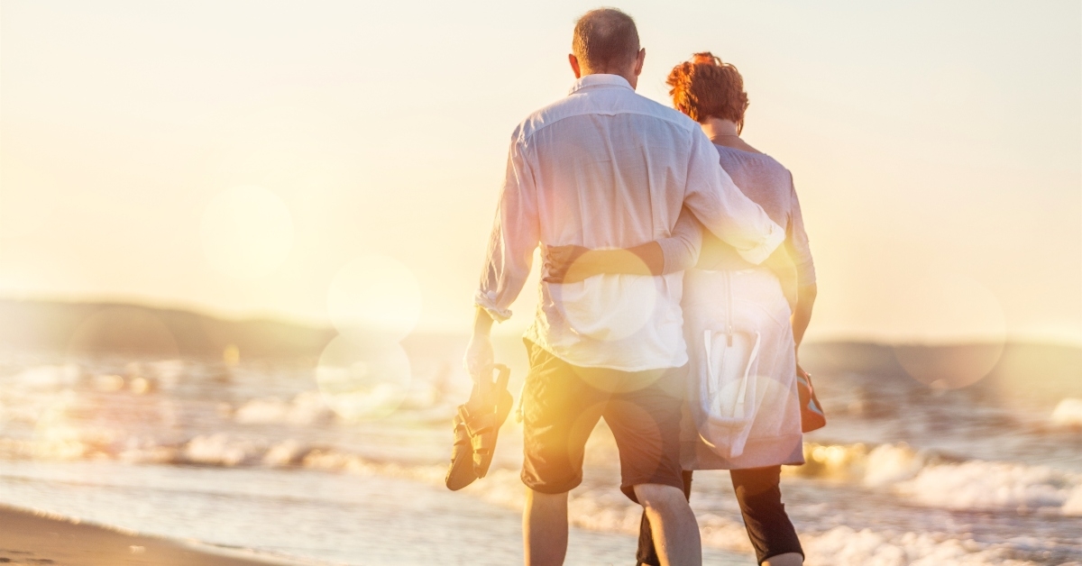 Couple walking on beach