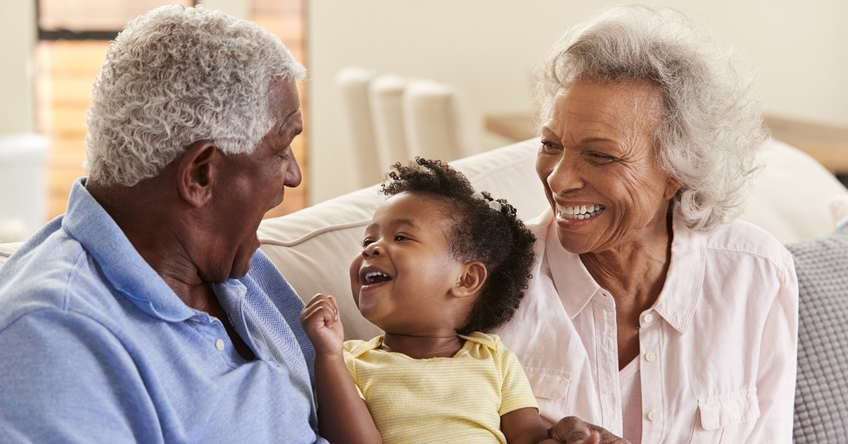 Happy grandparents with grandchild