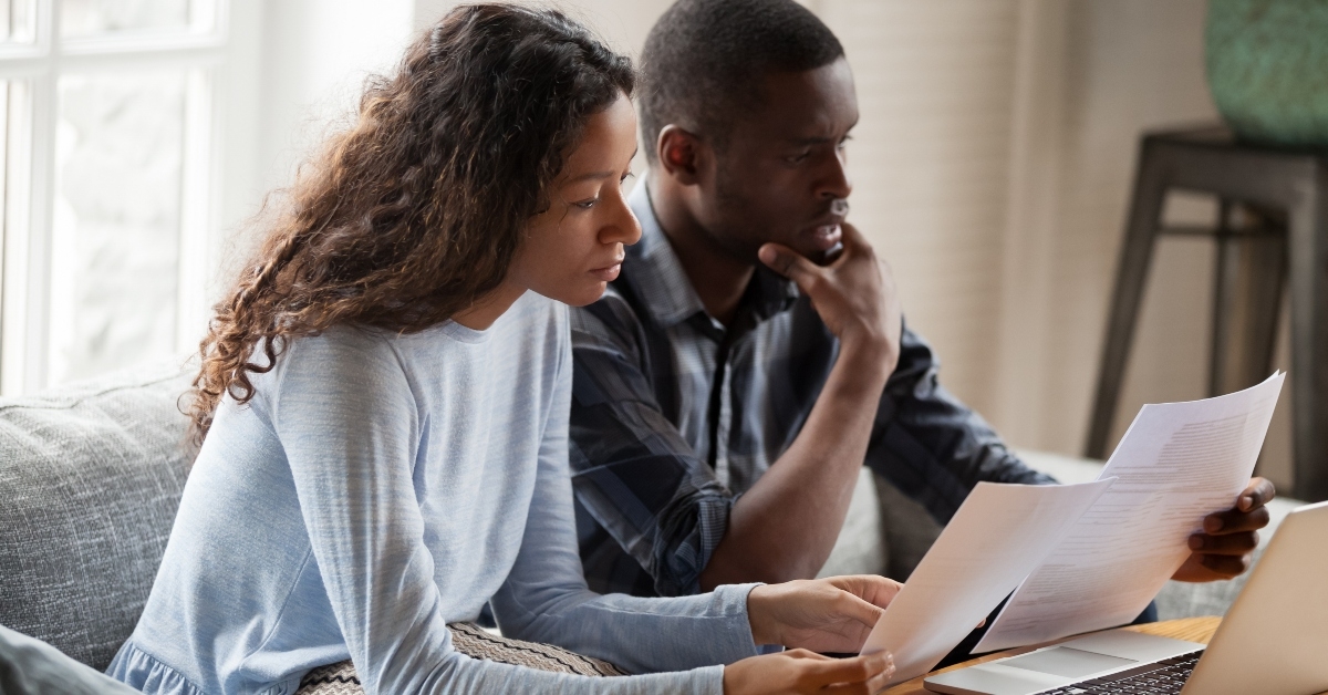 Couple reviewing bills