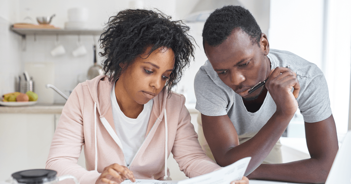 Couple paying mortgage