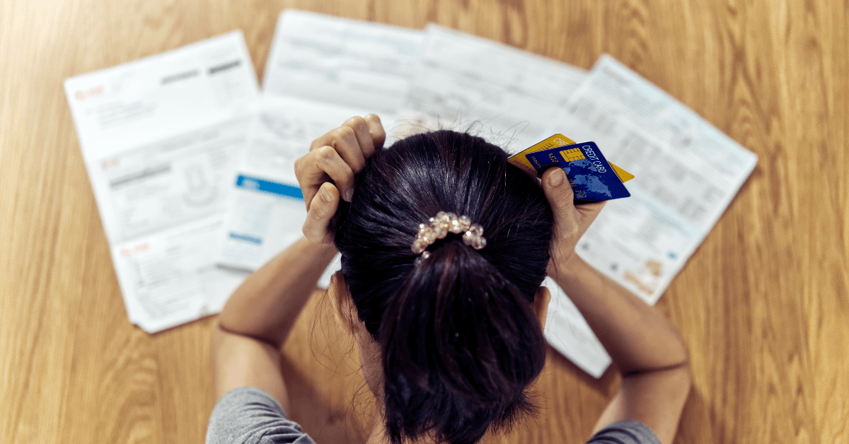 Woman stressed about paying bills