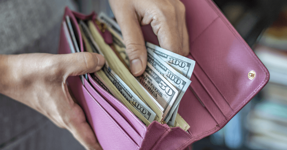 pulling cash from wallet