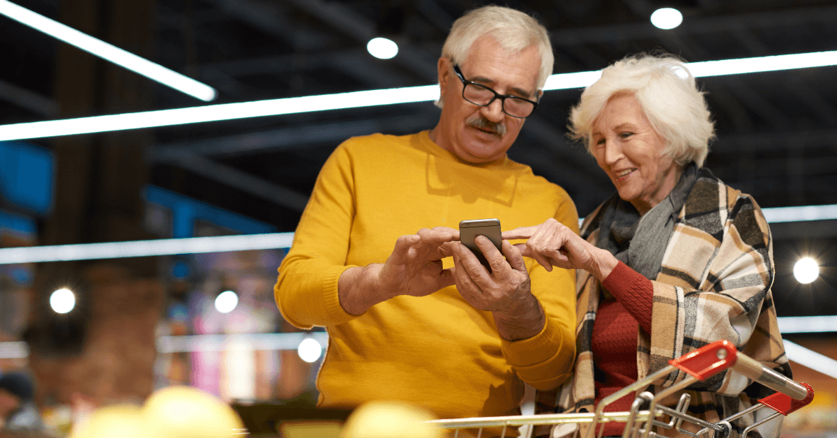 Senior couple looking at budget
