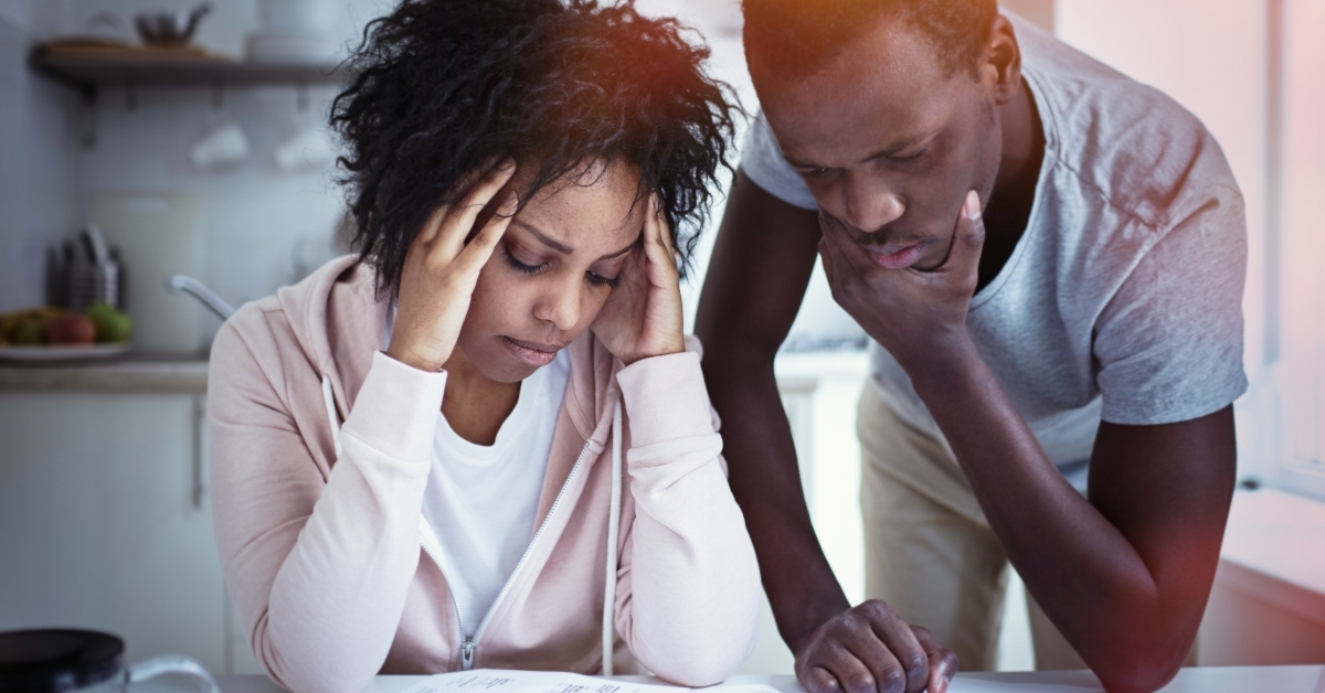 Couple looking at bills