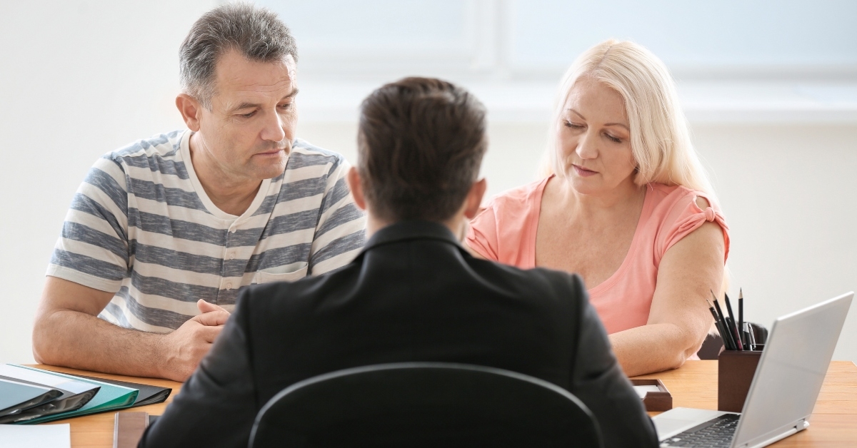 Couple meeting with attorney