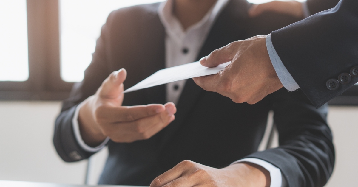 man getting paycheck