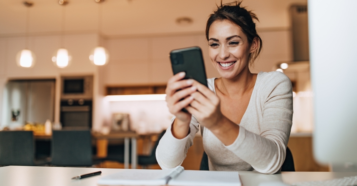 Smart woman looking at her phone