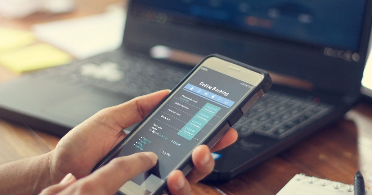 businessman using mobile smartphone with data information banking