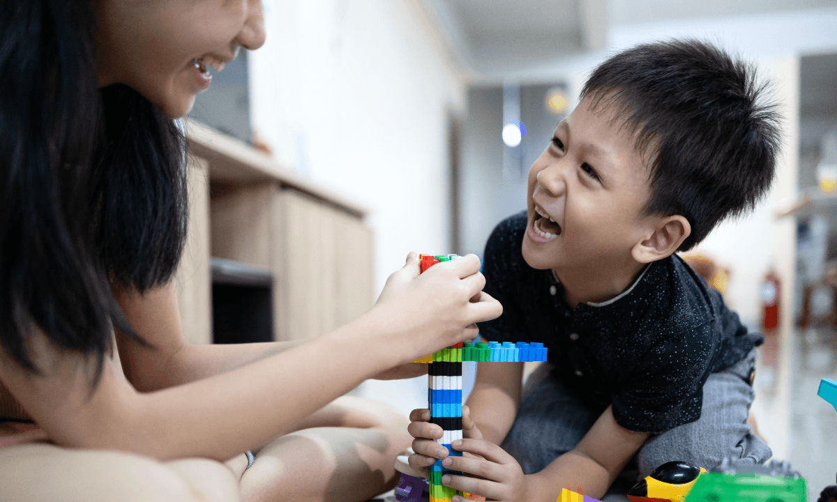 Mom and son playing with legos