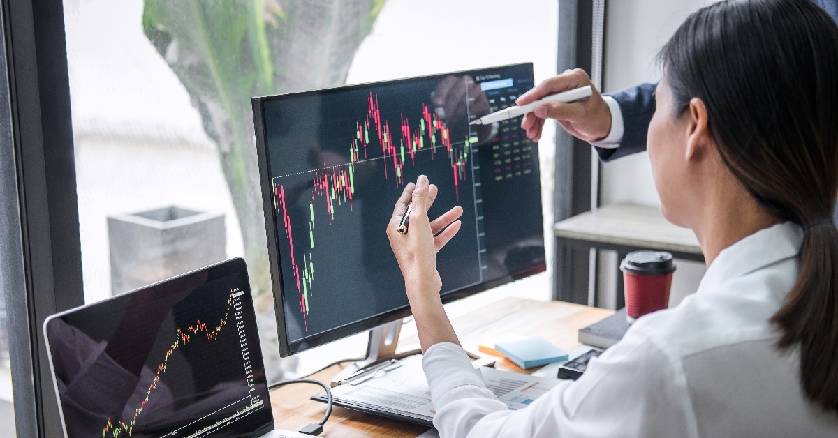 business team investment working with computer