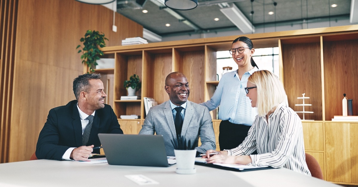 diverse group of businesspeople laughing together