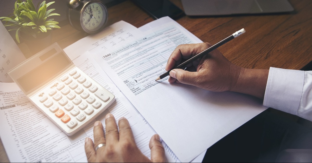 accountant is calculating company's annual tax