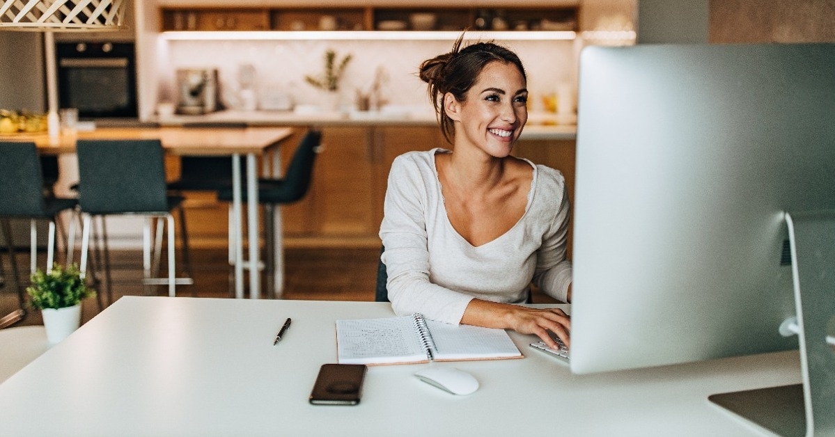 toothy smile sitting and reading news