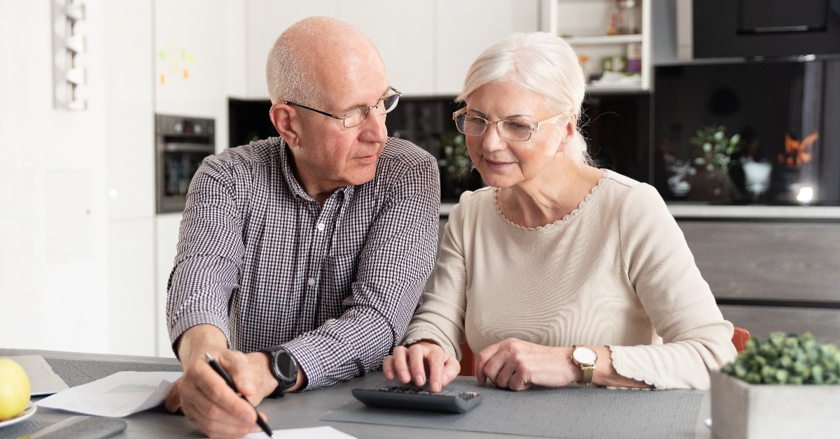 senior couple discussing investment