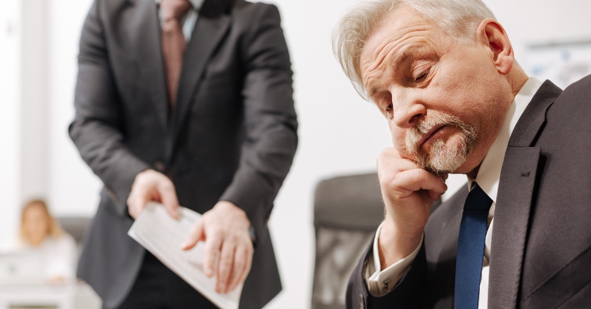 indifferent employer expressing apathy in the office