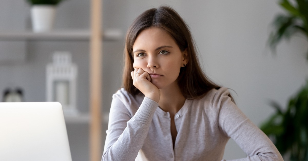 tired young woman feel bored working at laptop
