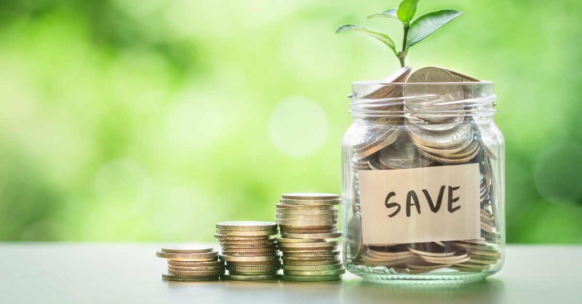 Coins in jar labeled 'save'