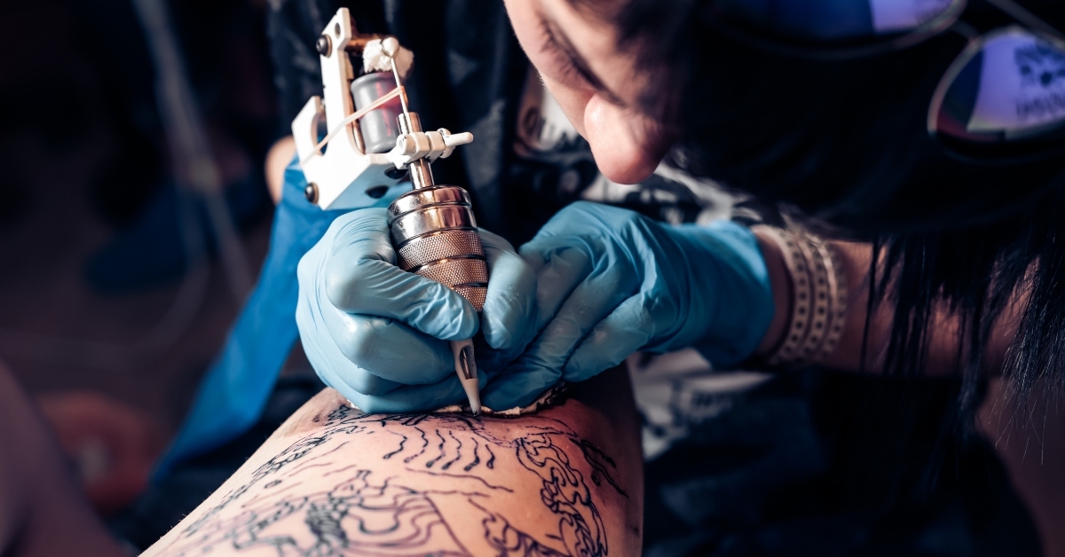 Artist giving a tattoo