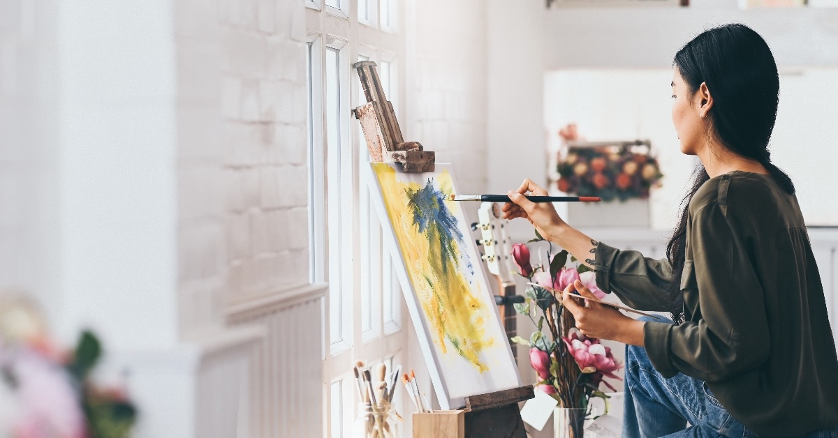 woman painting in the art studio