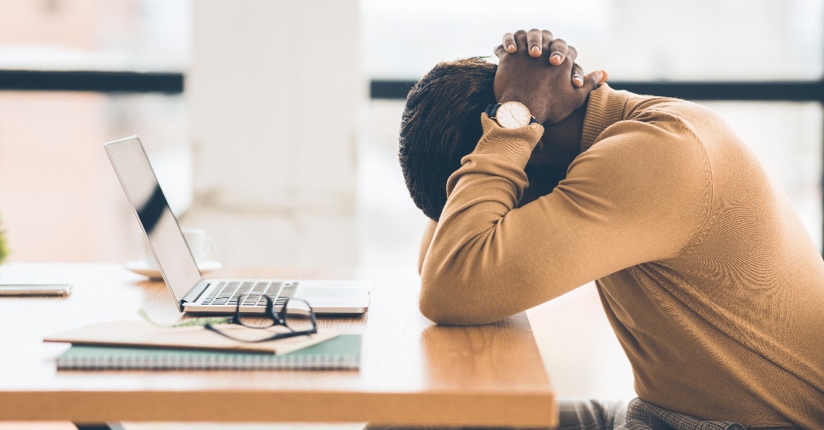 exhausted african american manager feeling sad and desperate