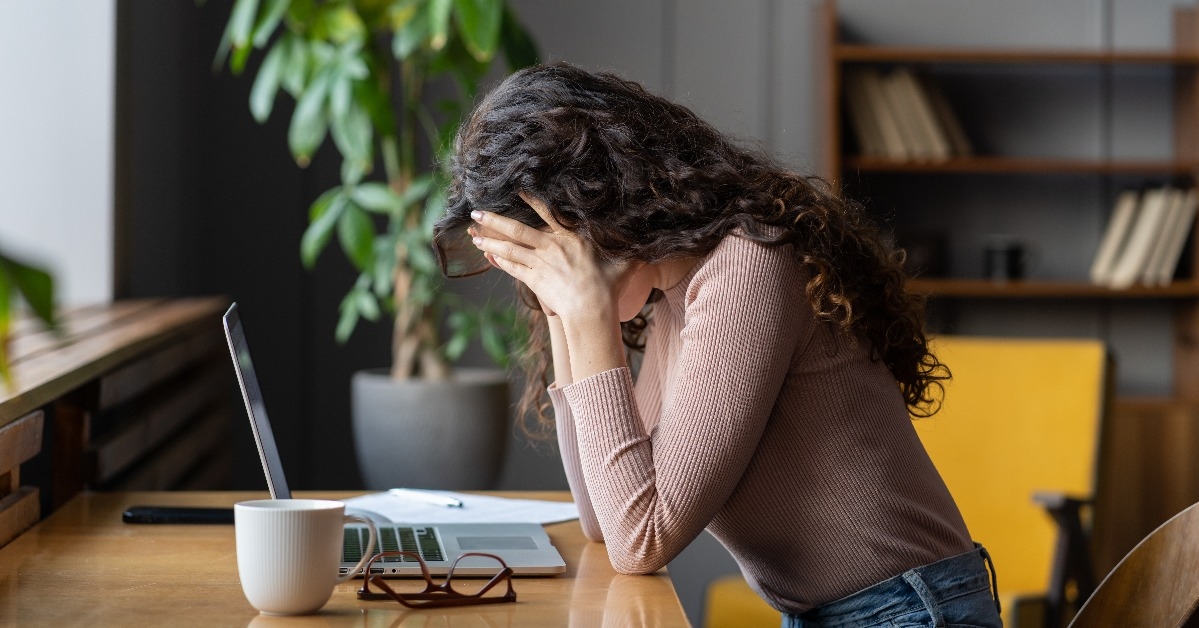 stressed frustrated female employee 
