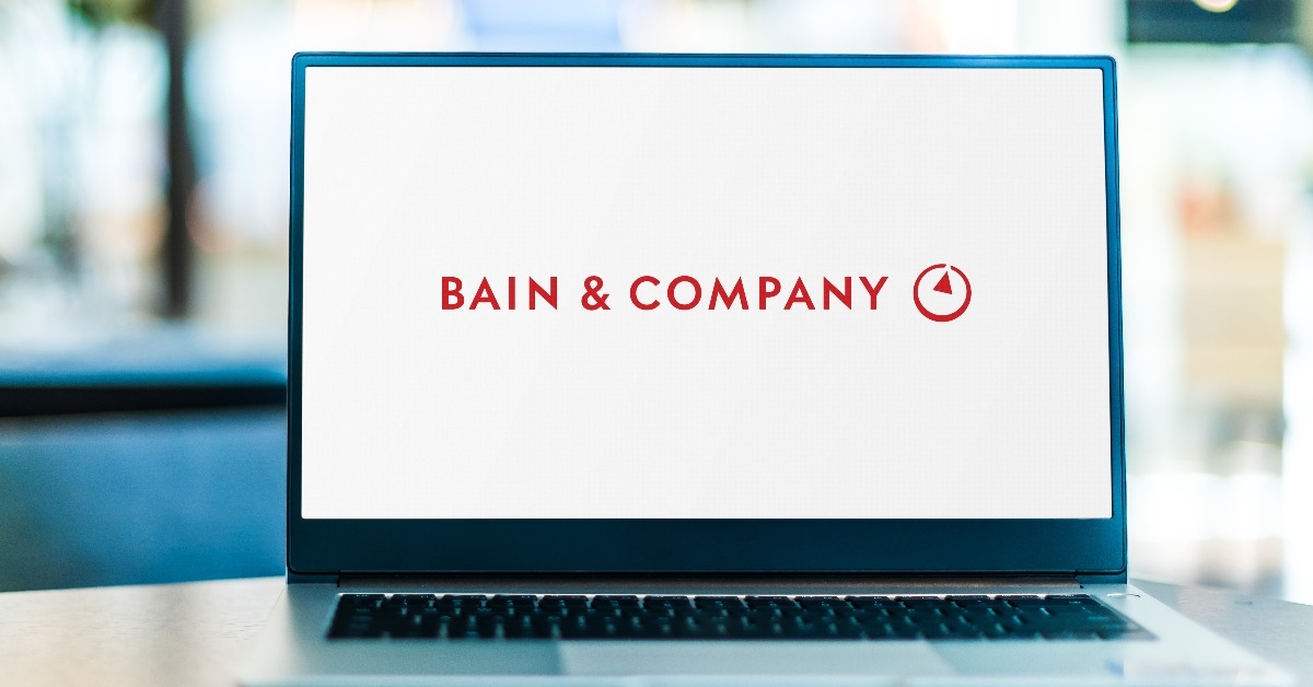 Laptop computer displaying logo of Bain and Company