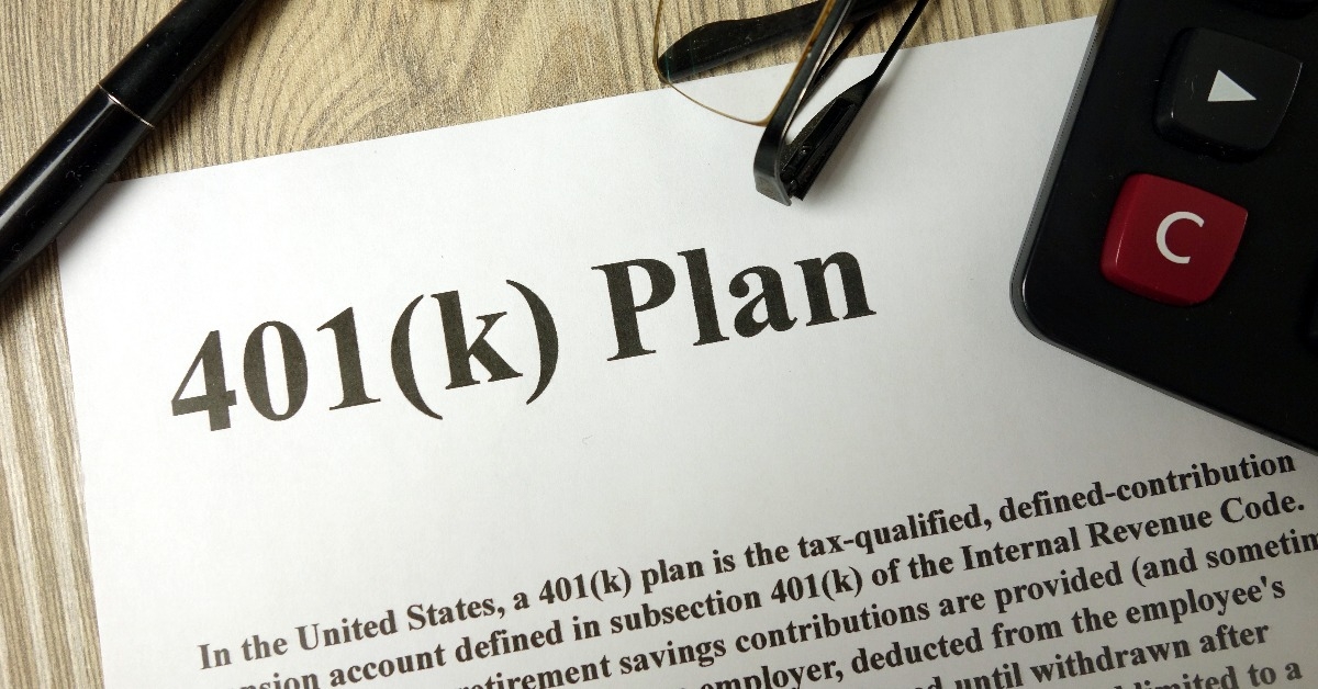 401k Plan with calculator pen and glasses