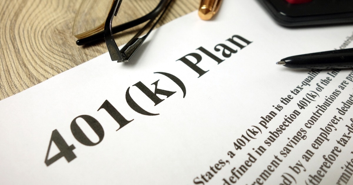 401k Plan with calculator pen and glasses