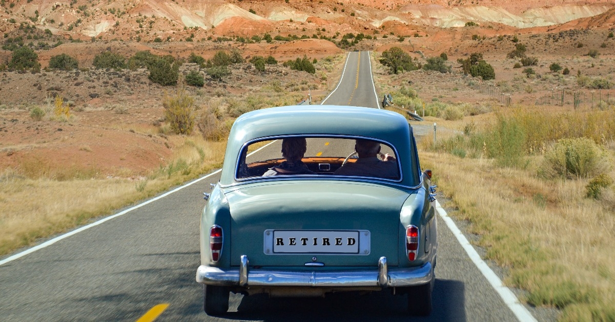 Oldtimer with old couple driving in retirement