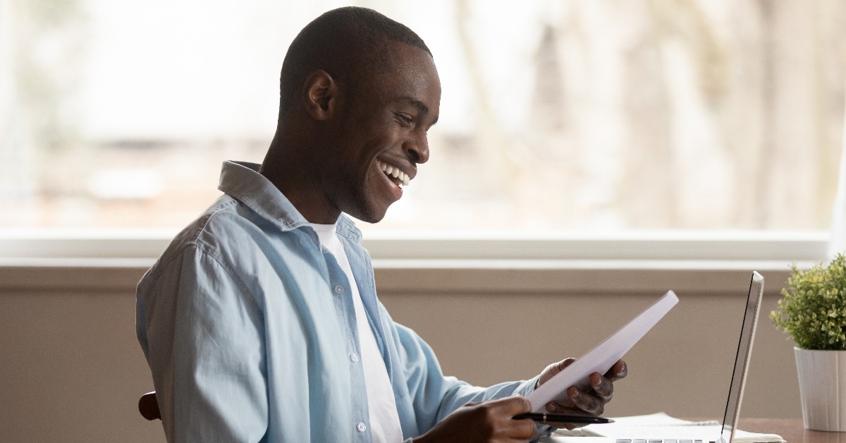 african guy feels happy