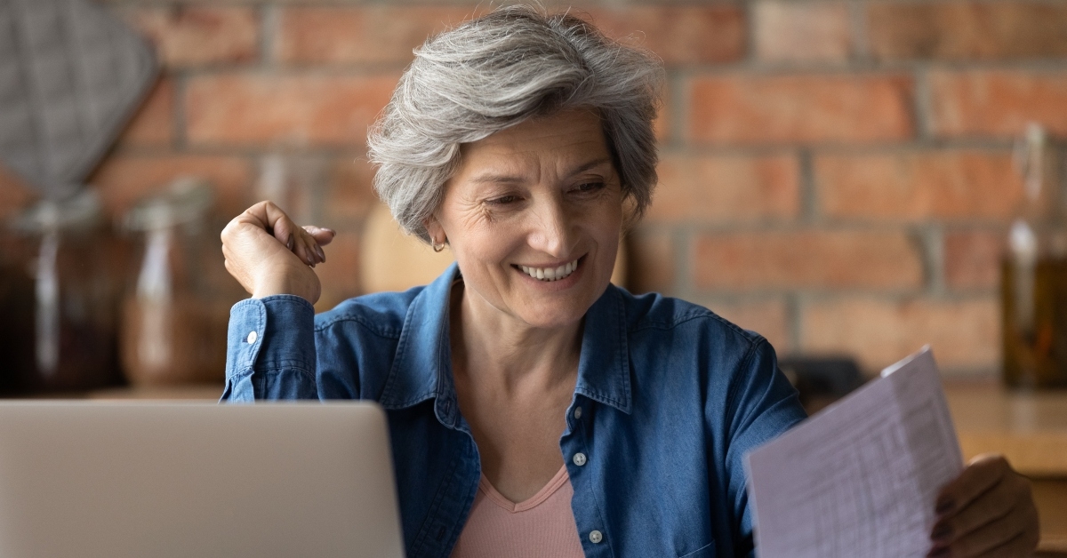 a woman is happy and feeling achieved