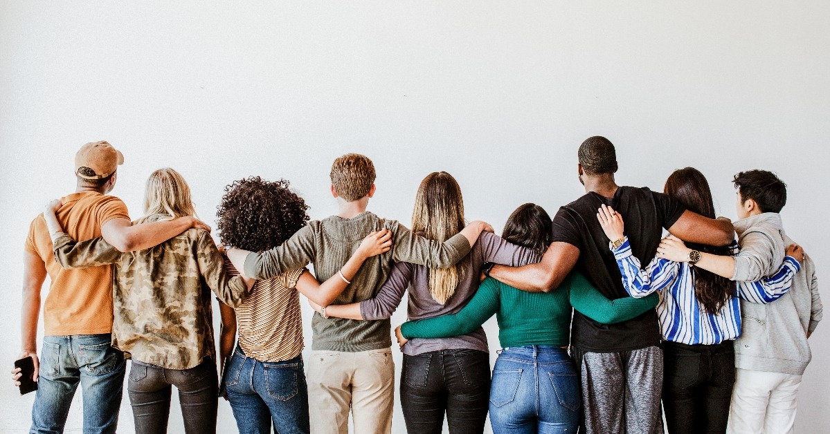 Group of people supporting each other