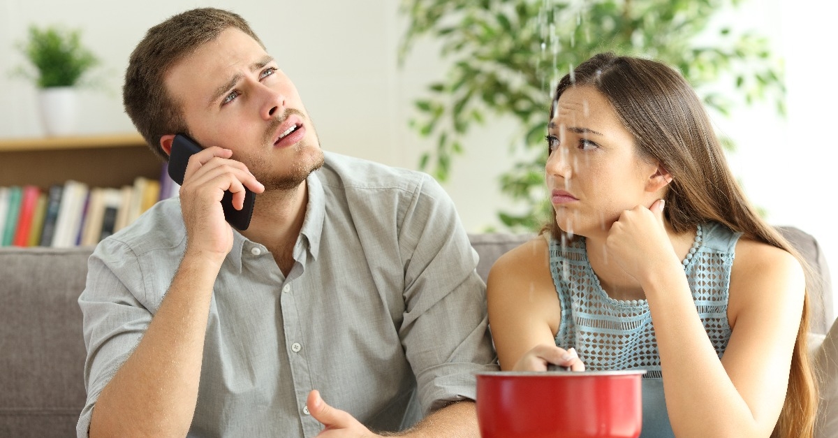 couple calling to insurance