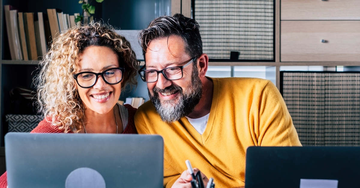 Couple working on computer