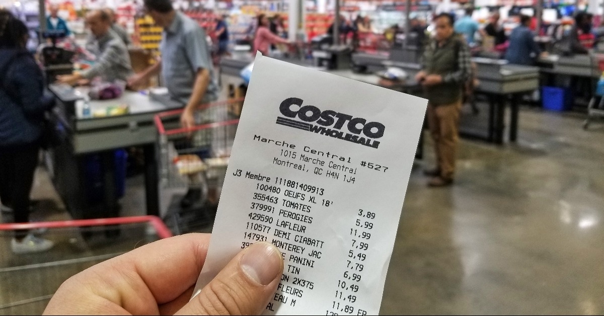 hand holding Costco receipt
