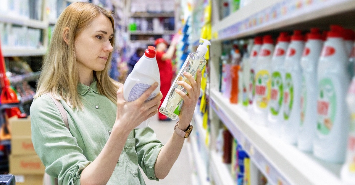 Woman choosing detergents